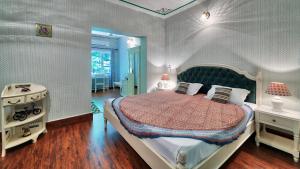 Postel nebo postele na pokoji v ubytování Ikaki Niwas - A Heritage Boutique Hotel