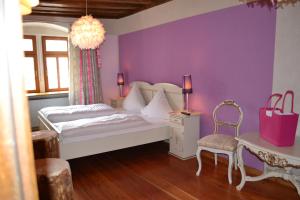 Postel nebo postele na pokoji v ubytování Hotel Turmdieb