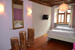 Postel nebo postele na pokoji v ubytování Hotel Turmdieb