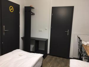 Łóżko lub łóżka w pokoju w obiekcie Kimanoclegi