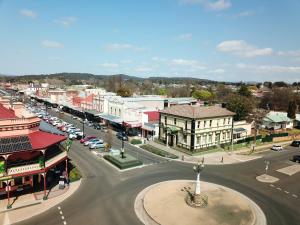 an aerial view of a town with a street at The Bank Guesthouse Glen Innes in Glen Innes