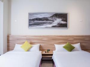 Postel nebo postele na pokoji v ubytování Rainbow Hotel + 37 fotografií