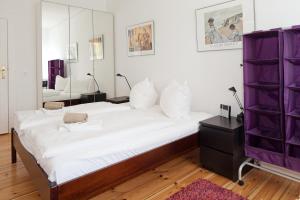 Кровать или кровати в номере Schloss Apartment