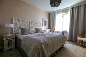 Postel nebo postele na pokoji v ubytování Boutique Hotel Yöpuu