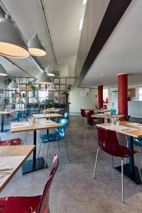 Reštaurácia alebo iné gastronomické zariadenie v ubytovaní Hotel Oleggio Malpensa
