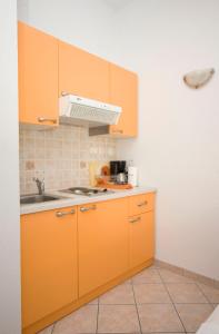Kuchyňa alebo kuchynka v ubytovaní Ella Apartments