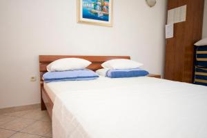 Posteľ alebo postele v izbe v ubytovaní Ella Apartments