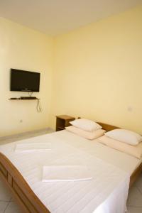 Posteľ alebo postele v izbe v ubytovaní Ella Apartments