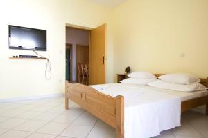 Posteľ alebo postele v izbe v ubytovaní Ella Apartments