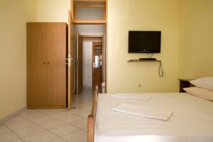Posteľ alebo postele v izbe v ubytovaní Ella Apartments