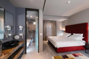 Postel nebo postele na pokoji v ubytování Hotel Egnatia