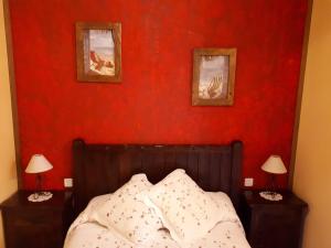 Ein Bett oder Betten in einem Zimmer der Unterkunft Posada La Vieja Escuela