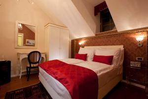 Postel nebo postele na pokoji v ubytování Hotel Actum