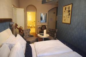 Postel nebo postele na pokoji v ubytování Hotel Actum