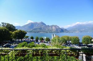 a view of a lake with mountains in the background at Appartamenti Il Sogno in Bellagio