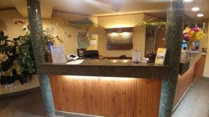 TV a/nebo společenská místnost v ubytování Palace Inn & Suites