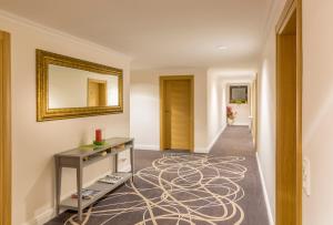 Postel nebo postele na pokoji v ubytování Hotel Lang