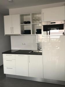 A kitchen or kitchenette at Luxury Apartment Playa del Ingles