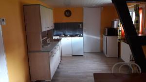 Η κουζίνα ή μικρή κουζίνα στο Meublé de tourisme +3 φωτογραφίες