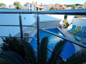 Bazén v ubytovaní Apartments Villa Holiday alebo v jeho blízkosti