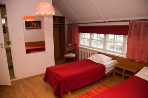 Postelja oz. postelje v sobi nastanitve Repo Hotel