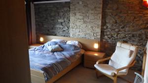 Voodi või voodid majutusasutuse Le Clos Arboré (Gîte) toas