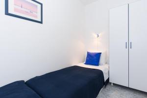 Posteľ alebo postele v izbe v ubytovaní Apartments Krajina