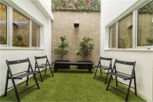 Jardín al aire libre en Hotel Ciudad del Mar