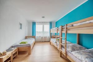 Poschodová posteľ alebo postele v izbe v ubytovaní Hýbadlo
