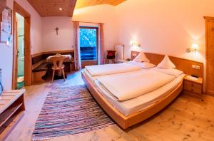 En eller flere senge i et værelse på Hotel Jägerhof