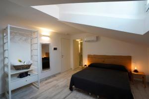 A bed or beds in a room at Approdo 36