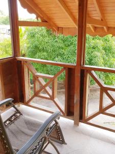 Μπαλκόνι ή βεράντα στο Seawind Cottage Authentic St.Lucian Accommodation near Plantation Beach