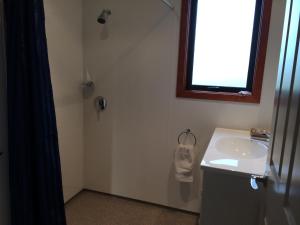 Vonios kambarys apgyvendinimo įstaigoje Acheron Cottages