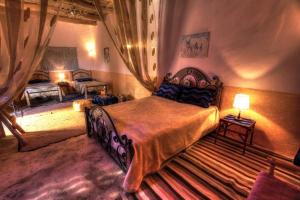 Letto o letti in una camera di Jardin de la source