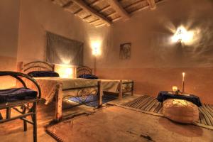 Letto o letti in una camera di Jardin de la source