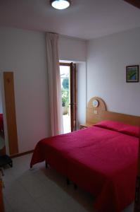 Posteľ alebo postele v izbe v ubytovaní Hotel e Ristorante Cassone