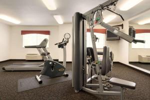 a fitness room with a gym with tread machines at Travelodge by Wyndham Dunsmuir in Dunsmuir