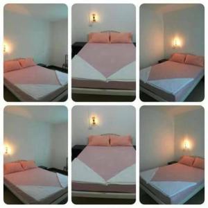 Postel nebo postele na pokoji v ubytování Thanathorn Guesthouse