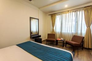 Ένα ή περισσότερα κρεβάτια σε δωμάτιο στο Gaju Suite Hotel