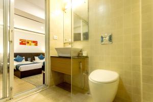 Ένα μπάνιο στο Gaju Suite Hotel