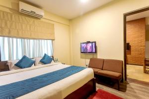 Ένα ή περισσότερα κρεβάτια σε δωμάτιο στο Gaju Suite Hotel
