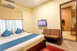 Ένα ή περισσότερα κρεβάτια σε δωμάτιο στο Gaju Suite Hotel
