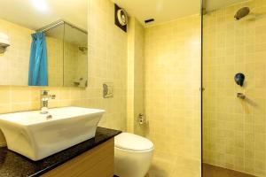 Ένα μπάνιο στο Gaju Suite Hotel