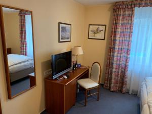 Ein Bett oder Betten in einem Zimmer der Unterkunft Gästehaus Alpinia