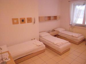 Posteľ alebo postele v izbe v ubytovaní Standard Delegacyjny Bed & Breakfast