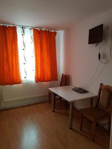 TV a/nebo společenská místnost v ubytování Hotel Magnolia