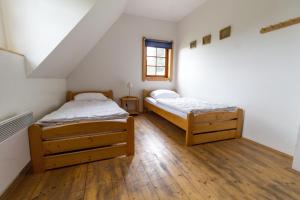 Posteľ alebo postele v izbe v ubytovaní Holiday Villa Stupna