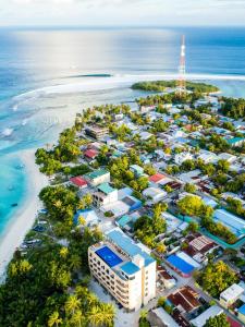 an aerial view of a resort next to the ocean at Season Paradise in Thulusdhoo