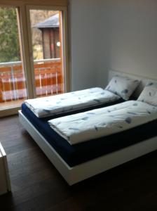 Postel nebo postele na pokoji v ubytování 6 Dorfstrasse