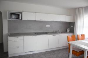 Köök või kööginurk majutusasutuses Penzion Apartmány Adamčík